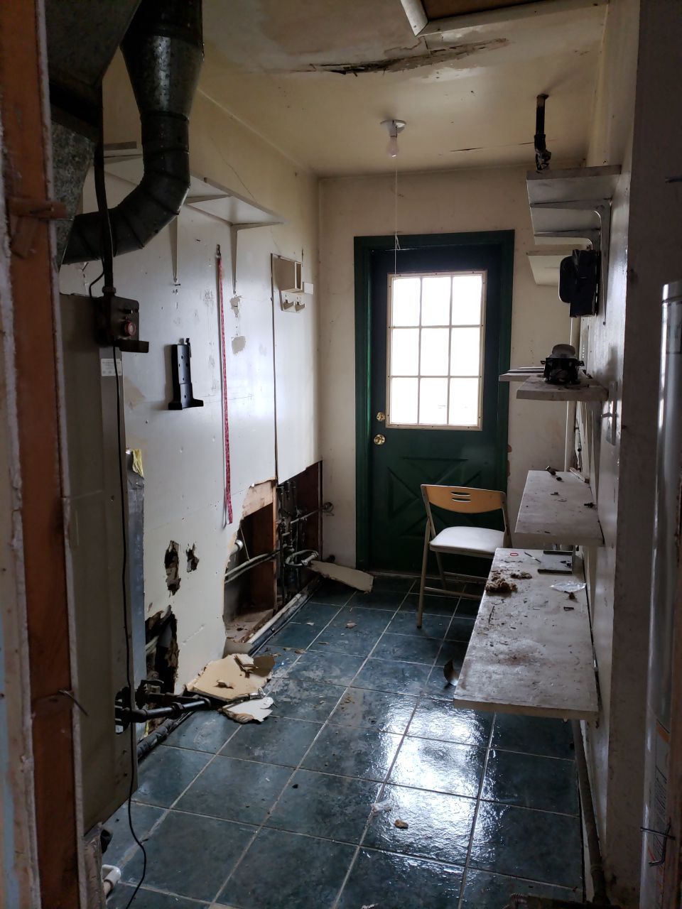 The laundry room needed to be cleaned up and some new drywall